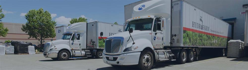 Hydrofarm trucks parked at the fullfillment center